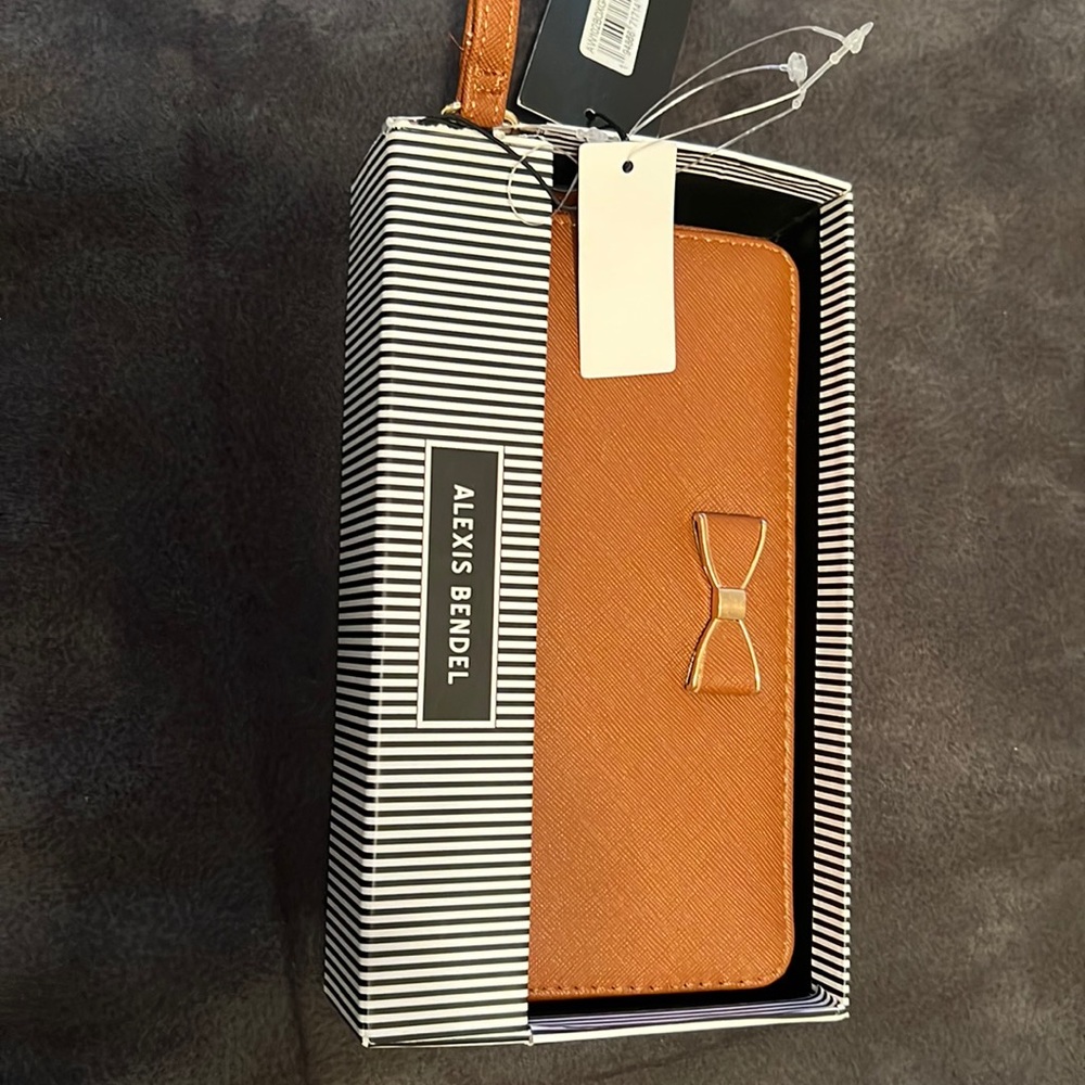 Tan wallet with bow tie